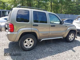 2004 Jeep Liberty Limited with VIN 1J4GL58K04W320182, listed as a IAAI auction lot 42787881 with 160,092 mi miles and . Bid and sale history available at DreamBid. Image 4.