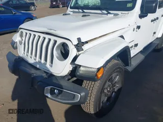 2018 Jeep Wrangler Unlimited Sahara z VIN 1C4HJXEG9JW227829, wystawiony jako IAAI lot #42099356 z przebiegiem 130 259 mil mil oraz . Historia ofert i sprzedaży dostępna na DreamBid. Obrazek 6.