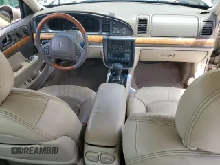 2001 Lincoln Continental z VIN 1LNHM97V91Y622267, wystawiony jako Copart lot #59915445 z przebiegiem 77 070 mil mil oraz Szkoda całkowita • Salvage title. Historia ofert i sprzedaży dostępna na DreamBid. Obrazek 8.