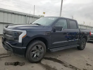 2023 Ford F-150 Lightning Pro z VIN 1FT6W1EV8PWG38071, wystawiony jako Copart lot #51091495 z przebiegiem 13 687 mil mil oraz Szkody całkowita. Historia ofert i sprzedaży dostępna na DreamBid. Obrazek 1.