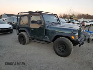 2005 Jeep Wrangler SE with VIN 1J4FA29155P363501, listed as a Copart auction lot 80388314 with 97,564 mi miles and Clean Title. Bid and sale history available at carsss.com. Image 4.