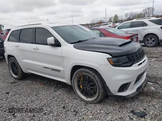2018 Jeep Grand Cherokee Trackhawk with VIN 1C4RJFN96JC293787, listed as a IAAI auction lot 39122517 with 69,781 mi miles and . Bid and sale history available at DreamBid. Image 1.