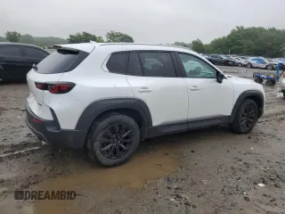 2025 Mazda CX-50 S Premium z VIN 7MMVABDM9SN331032, wystawiony jako Copart lot #60797015 z przebiegiem 9 572 mil mil oraz Nie do naprawy • Non repairable. Historia ofert i sprzedaży dostępna na DreamBid. Obrazek 3.
