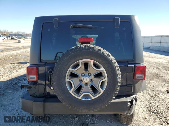 2013 Jeep Wrangler Unlimited Rubicon 10th Anniversary с VIN 1C4HJWFG7DL559539, выставлен на аукционе Copart как лот 81675894 с пробегом 99 425 миль миль и Списание • Salvage title. История ставок и продаж доступна на DreamBid. Изображение 6.