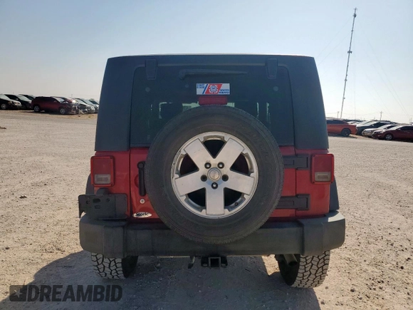 2009 Jeep Wrangler X with VIN 1J4FA24189L776078, listed as a Copart auction lot 57902705 with 104,994 mi miles and Salvage title. Bid and sale history available at DreamBid. Image 6.