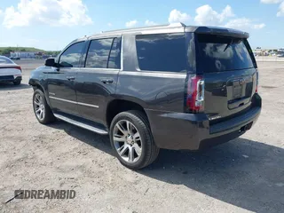 2016 GMC Yukon SLT with VIN 1GKS2BKC2GR277460, listed as a IAAI auction lot 42027026 with 111,191 mi miles. Bid and sale history available at carsss.com. Image 3.