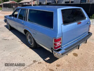 1988 Chevrolet Caprice z VIN 1G1BN81Y8JR214558, wystawiony jako Copart lot #59442205 z przebiegiem 89 217 mil mil oraz Czysty tytuł • Clean title. Historia ofert i sprzedaży dostępna na DreamBid. Obrazek 3.