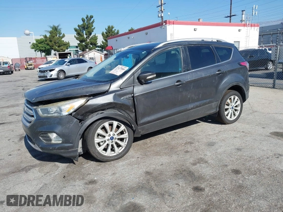 2018 Ford Escape Titanium with VIN 1FMCU0J98JUA03474, listed as a IAAI auction lot 37677880 with 106,423 mi miles and . Bid and sale history available at DreamBid. Image 17.