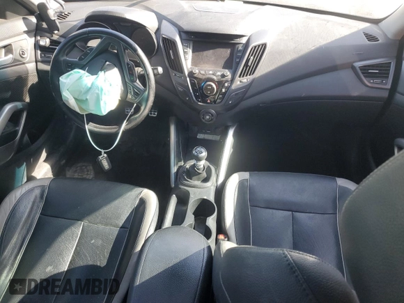 2015 Hyundai Veloster Turbo z VIN KMHTC6AE4FU221891, wystawiony jako Copart lot #58857565 z przebiegiem 144 671 mil mil oraz Szkoda całkowita • Salvage title. Historia ofert i sprzedaży dostępna na DreamBid. Obrazek 8.