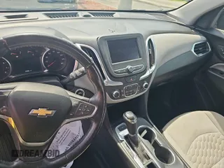 2021 Chevrolet Equinox LT z VIN 3GNAXTEV6MS111390, wystawiony jako IAAI lot #42849626 z przebiegiem 94 984 mil mil oraz . Historia ofert i sprzedaży dostępna na DreamBid. Obrazek 6.