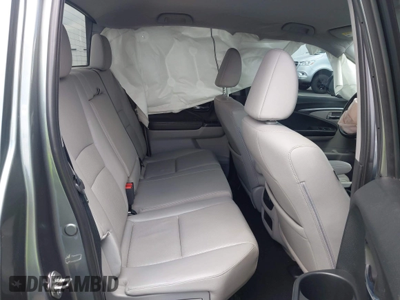 2017 Honda Ridgeline RTL-T with VIN 5FPYK2F63HB001488, listed as a IAAI auction lot 40078694 with Not provided miles and . Bid and sale history available at DreamBid. Image 8.