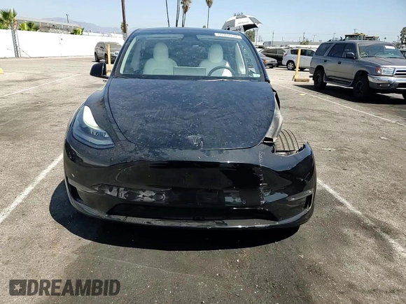 2022 Tesla Model Y Performance with VIN 7SAYGDEF4NF436834, listed as a Copart auction lot 68992234 with 22,171 mi miles and Salvage title. Bid and sale history available at DreamBid. Image 11.