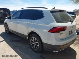 2019 Volkswagen Tiguan SE with VIN 3VV2B7AX1KM092616, listed as a IAAI auction lot 41868660 with 147,419 mi miles. Bid and sale history available at carsss.com. Image 3.