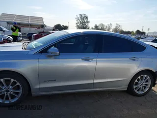 2019 Ford Fusion SEL with VIN 3FA6P0MU8KR148778, listed as a IAAI auction lot 41841745 with 182,074 mi miles and . Bid and sale history available at DreamBid. Image 15.