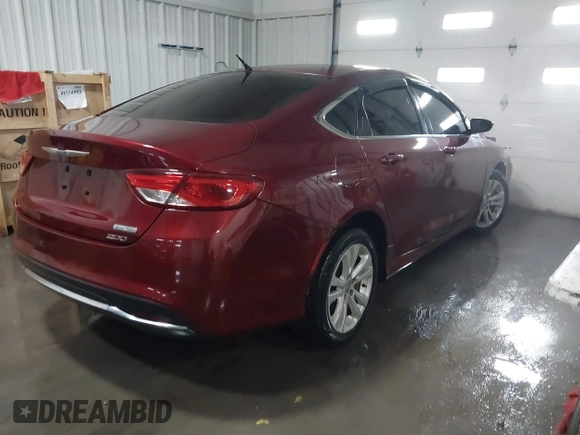 2015 Chrysler 200 Limited with VIN 1C3CCCAB7FN667315, listed as a IAAI auction lot 41256721 with 73,416 mi miles. Bid and sale history available at carsss.com. Image 4.