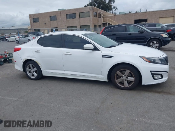 2015 Kia Optima LX with VIN KNAGM4A74F5662579, listed as a IAAI auction lot 42127251 with 144,138 mi miles and . Bid and sale history available at carsss.com. Image 12.