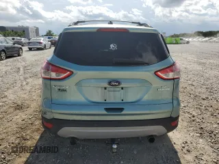 2013 Ford Escape SE z VIN 1FMCU0GX8DUA92814, wystawiony jako Copart lot #61564665 z przebiegiem 110 854 mil mil oraz Szkoda całkowita • Salvage title. Historia ofert i sprzedaży dostępna na DreamBid. Obrazek 6.