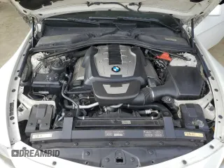 2006 BMW 6 Series 650Ci z VIN WBAEK134X6CN77921, wystawiony jako Copart lot #54093355 z przebiegiem 162 363 mil mil oraz Czysty tytuł • Clean title. Historia ofert i sprzedaży dostępna na DreamBid. Obrazek 11.