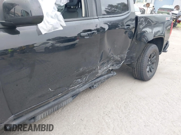 2019 Chevrolet Colorado 4WD Z71 with VIN 1GCGTDEN5K1289956, listed as a IAAI auction lot 41729406 with 60,887 mi miles. Bid and sale history available at carsss.com. Image 12.