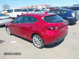 2014 Mazda 3 S Touring with VIN JM1BM1L36E1139818, listed as a IAAI auction lot 42052687 with 134,397 mi miles and . Bid and sale history available at DreamBid. Image 3.