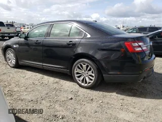 2016 Ford Taurus Limited with VIN 1FAHP2F82GG111485, listed as a Copart auction lot 50736735 with 135,618 mi miles and Salvage Title. Bid and sale history available at DreamBid. Image 2.