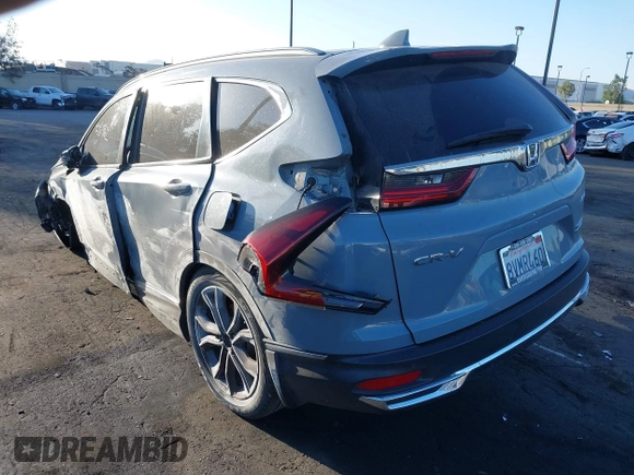 2021 Honda CR-V Touring with VIN 7FART6H97ME010816, listed as a IAAI auction lot 42256962 with 86,223 mi miles and . Bid and sale history available at DreamBid. Image 3.