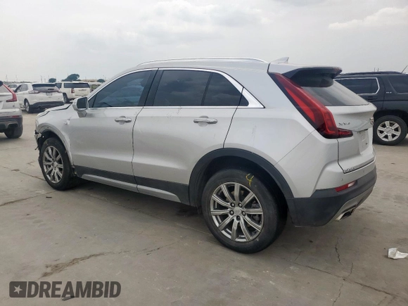 2021 Cadillac XT4 FWD Premium Luxury z VIN 1GYFZCR42MF004233, wystawiony jako Copart lot #57229385 z przebiegiem 98 387 mil mil oraz Szkody całkowita. Historia ofert i sprzedaży dostępna na DreamBid. Obrazek 2.