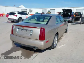 2005 Cadillac STS z VIN 1G6DC67A950171835, wystawiony jako IAAI lot #41599105 z przebiegiem 74 235 mil mil oraz . Historia ofert i sprzedaży dostępna na DreamBid. Obrazek 4.