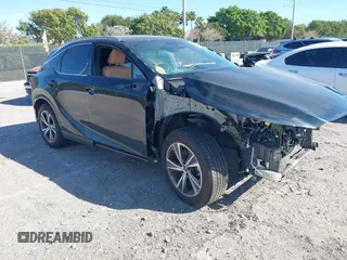 2024 Lexus RX with VIN JTJCHMAA3R2018477, listed as a IAAI auction lot 41738156 with 7,480 mi miles. Bid and sale history available at carsss.com. Image 1.