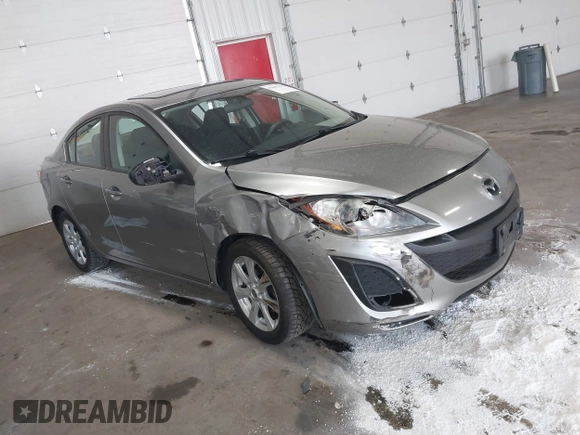 2011 Mazda Mazda3 i Touring with VIN JM1BL1VFXB1900999, listed as a IAAI auction lot 42067239 with 202,829 mi miles. Bid and sale history available at carsss.com. Image 1.