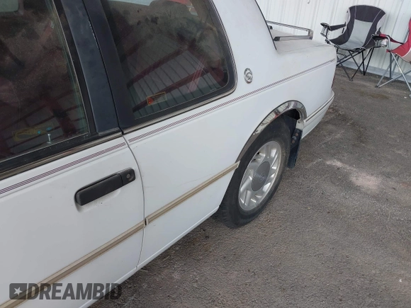 1992 Mercury Cougar z VIN 1MEPM6045NH646487, wystawiony jako IAAI lot #42345310 z przebiegiem 72 579 mil mil oraz . Historia ofert i sprzedaży dostępna na DreamBid. Obrazek 6.