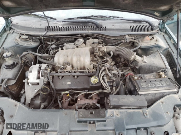 1997 Ford Taurus G with VIN 1FALP51U2VG299048, listed as a Copart auction lot 85742504 with 123,356 mi miles and Salvage Title. Bid and sale history available at carsss.com. Image 13.