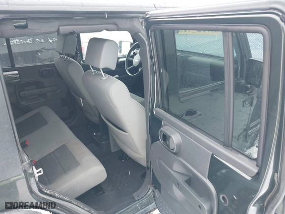 2010 Jeep Wrangler Unlimited Sport with VIN 1J4BA3H12AL127802, listed as a IAAI auction lot 41237029 with 94,320 mi miles. Bid and sale history available at carsss.com. Image 8.