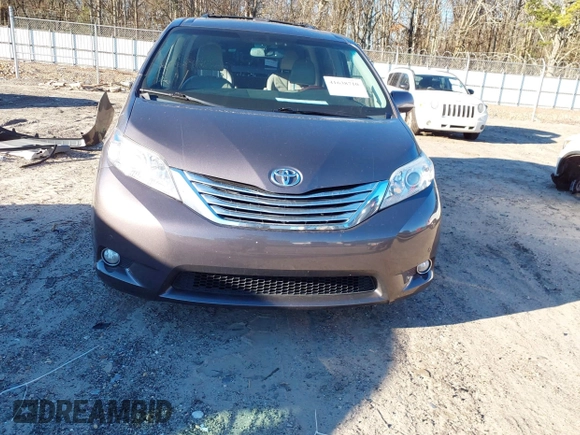 2011 Toyota Sienna XLE with VIN 5TDDK3DC8BS009739, listed as a IAAI auction lot 41638710 with 235,396 mi miles. Bid and sale history available at carsss.com. Image 12.