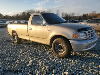 1999 Ford F-150 Work Series with VIN 1FTZF1722XNC16545, listed as a Copart auction lot 86887214 with 137,192 mi miles and Clean Title. Bid and sale history available at carsss.com. Image 4.