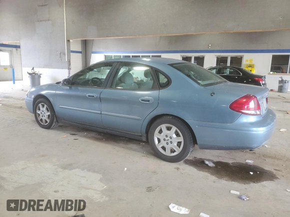 2007 Ford Taurus SE with VIN 1FAFP53U17A215432, listed as a Copart auction lot 64029215 with 121,190 mi miles and Salvage title. Bid and sale history available at DreamBid. Image 2.