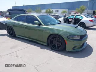 2021 Dodge Charger R/T with VIN 2C3CDXCT0MH652199, listed as a IAAI auction lot 42051678 with 11,798 mi miles and . Bid and sale history available at carsss.com. Image 1.
