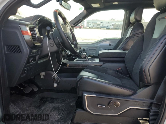 2023 Ford F-150 Raptor with VIN 1FTFW1RJ7PFA73609, listed as a Copart auction lot 45202695 with 22,974 mi miles and Salvage Title. Bid and sale history available at DreamBid. Image 7.