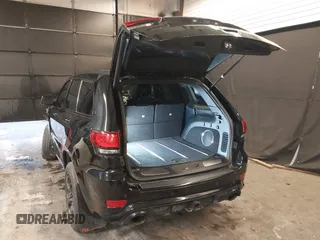 2017 Jeep Grand Cherokee SRT with VIN 1C4RJFDJ9HC819478, listed as a IAAI auction lot 41325490 with 63,551 mi miles. Bid and sale history available at carsss.com. Image 3.