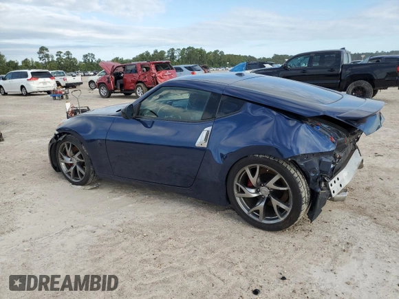 2013 Nissan 370Z with VIN JN1AZ4EH6DM880252, listed as a Copart auction lot 70528464 with 63,111 mi miles and Salvage Title. Bid and sale history available at carsss.com. Image 2.
