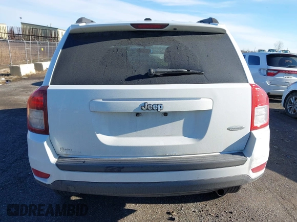 2014 Jeep Compass Latitude with VIN 1C4NJCEB0ED660019, listed as a IAAI auction lot 41200065 with 185,174 mi miles. Bid and sale history available at carsss.com. Image 16.