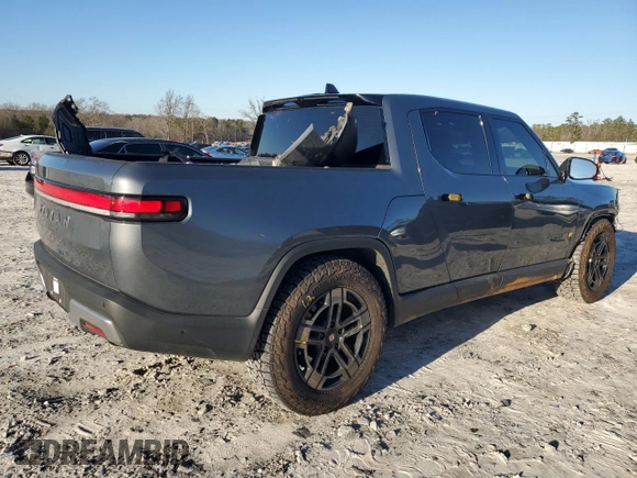 2023 Rivian R1T Adventure z VIN 7FCTGAAA1PN022134, wystawiony jako Copart lot #85545774 z przebiegiem 48 951 mil mil oraz Szkoda całkowita • Salvage title. Historia ofert i sprzedaży dostępna na DreamBid. Obrazek 3.