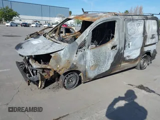 2014 Nissan NV200 S with VIN 3N6CM0KNXEK702480, listed as a IAAI auction lot 41967124 with Not Provided miles and . Bid and sale history available at DreamBid. Image 2.
