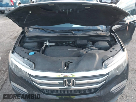 2016 Honda Pilot EX-L with VIN 5FNYF5H56GB031831, listed as a IAAI auction lot 41111342 with 244,197 mi miles and . Bid and sale history available at DreamBid. Image 10.