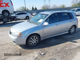 2006 Kia Spectra with VIN KNAFE161265317272, listed as a IAAI auction lot 42008875 with 169,983 mi miles. Bid and sale history available at carsss.com. Image 2.