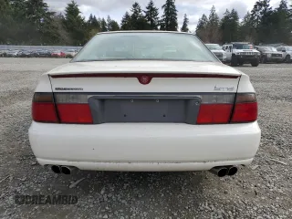 2000 Cadillac Seville Touring STS z VIN 1G6KY5497YU191639, wystawiony jako Copart lot #49658115 z przebiegiem 82 725 mil mil oraz Szkoda całkowita • Salvage title. Historia ofert i sprzedaży dostępna na DreamBid. Obrazek 6.