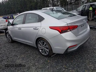 2021 Hyundai Accent Limited with VIN 3KPC34A6XME132842, listed as a IAAI auction lot 41268124 with 52,698 mi miles. Bid and sale history available at carsss.com. Image 3.