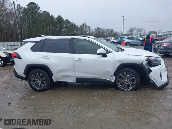 2023 Toyota RAV4 Hybrid XLE Premium with VIN JTMB6RFV4PD114763, listed as a IAAI auction lot 41766812 with 6,768 mi miles. Bid and sale history available at carsss.com. Image 13.