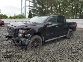 2019 Nissan Titan SL z VIN 1N6AA1E51KN529293, wystawiony jako Copart lot #57770425 z przebiegiem 65 539 mil mil oraz Szkoda całkowita • Salvage title. Historia ofert i sprzedaży dostępna na DreamBid. Obrazek 1.
