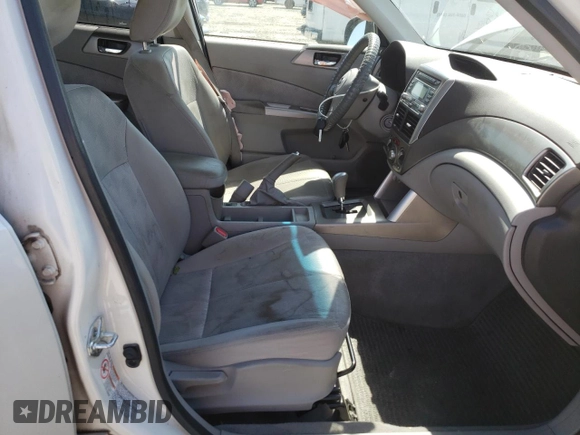 2009 Subaru Forester X with VIN JF2SH63679H777246, listed as a Copart auction lot 64516665 with 183,400 mi miles and Salvage title. Bid and sale history available at DreamBid. Image 7.